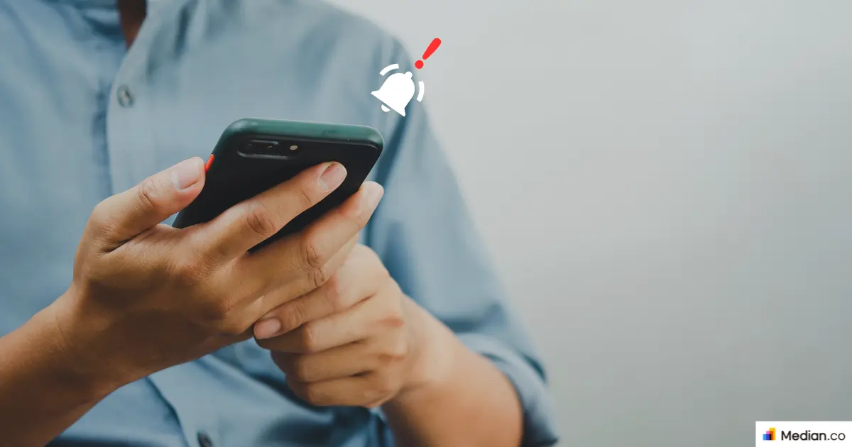 Man using a phone and is getting a push notification